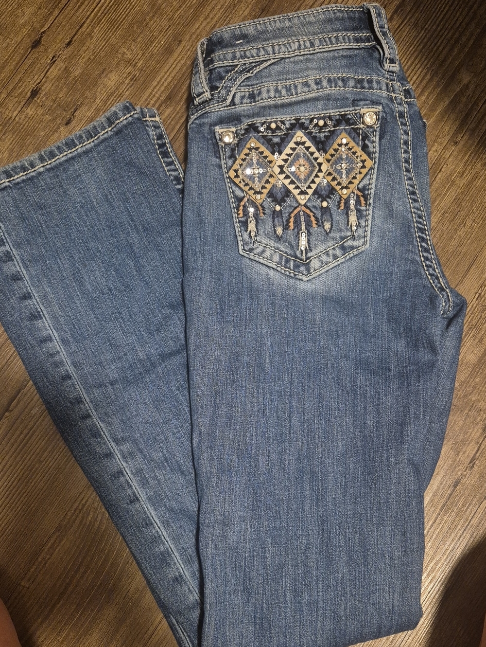 Miss Me Midrise Bootcut Jeans with Feather Embroidered Back Pocket